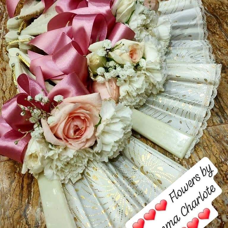 Pink and white floral fan arrangement by Flowers by Emmac Charlote